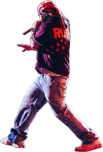 Russ performing on stage, mic in hand